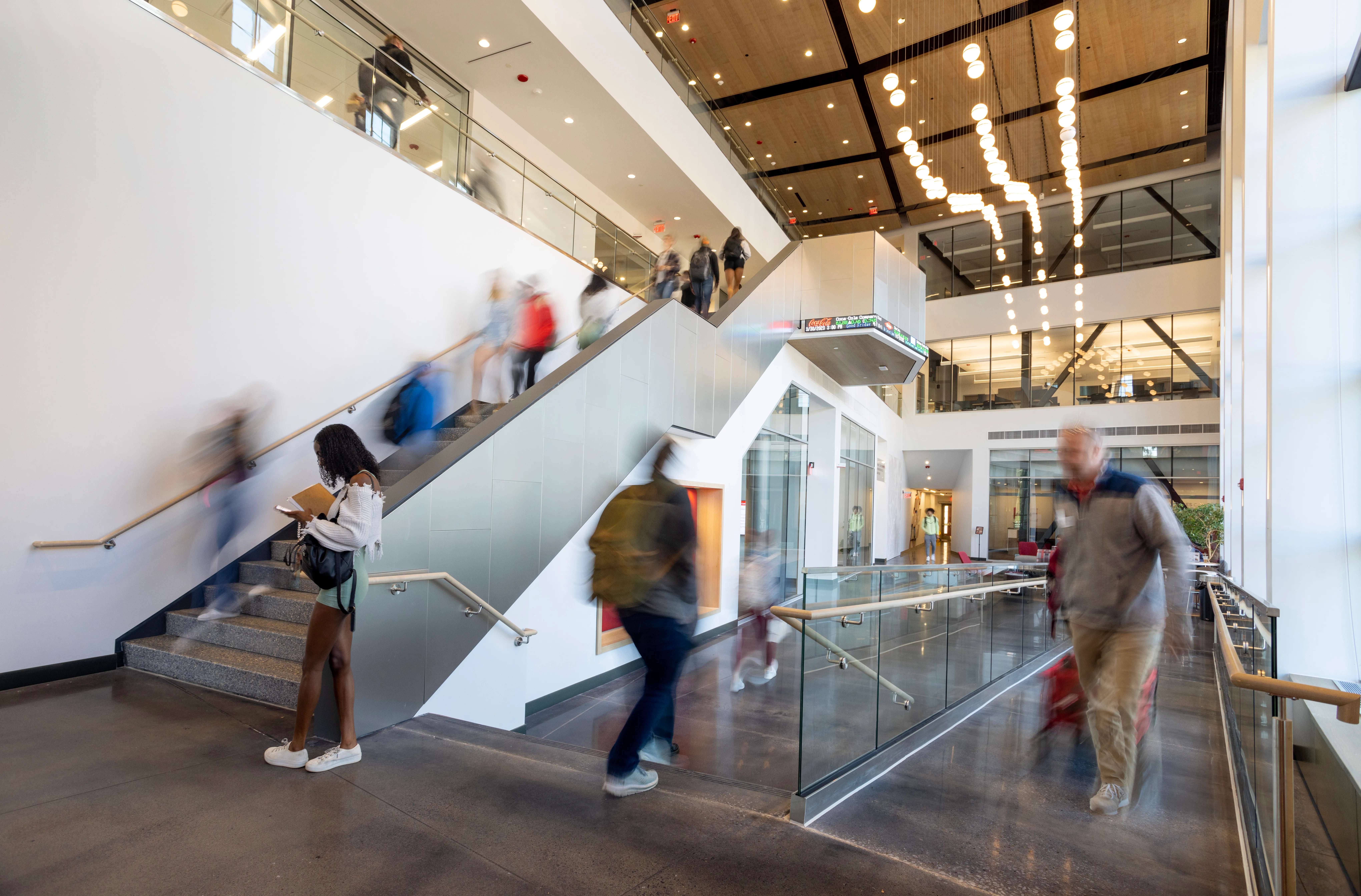 Students moving through a Drury academic building